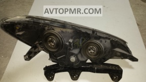 Фара передняя левая Toyota Sienna 04-06 галоген