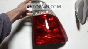 Lampa dreapta murdară în interiorul BMW X5 e53 restilizat 04-06