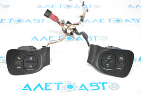 Butonul de control de pe volanul Fiat 500L 14-