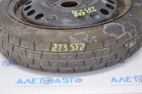 Roata de rezerva pentru Nissan Versa Note 13-19 R15 ruginită.