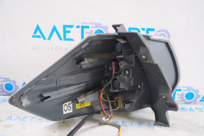 Lampa exterioară aripă dreapta Nissan Rogue 14-16, cu o mică fisură