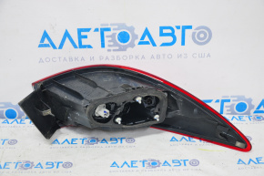 Lampa exterioară aripă dreaptă Mazda 6 13-15 SUA, deteriorare la fixare.