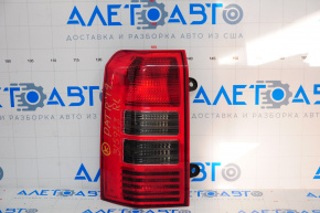 Lampa stânga Jeep Patriot 11-17, întunecată.