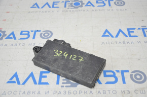 Modulul de control al blocării antifurt BMW 335i e92 07-13 are un suport rupt.