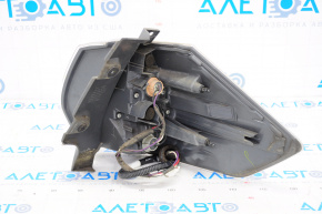 Lampa exterioară aripă stângă Nissan Rogue 14-16, ciobitură pe parbriz