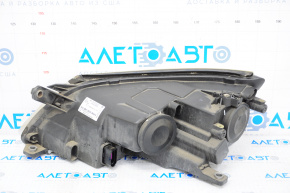 Far dreapta față VW Tiguan 09-11 goală, pre-restilizare, halogen, necesită polizare.