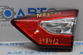 Lampa interioară pentru capacul portbagajului dreapta Ford Fusion mk5 13-16, uzură pe plastic.