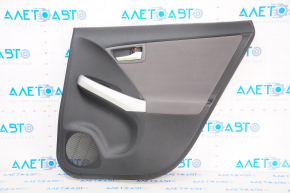 Capacul usii spate dreapta Toyota Prius 30 10-15, negru, cu insertie gri din material textil, zgarietura.