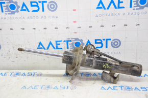 Амортизатор передний правый Mazda3 2.3 03-08
