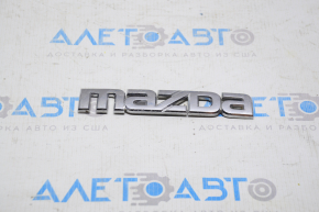 Emblema cu inscripția "Mazda" de pe ușa portbagajului Mazda CX-7 06-09