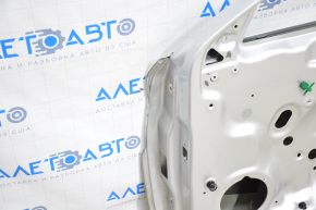 Дверь голая передняя правая VW Passat b8 16-19 USA серебро LA7W замята