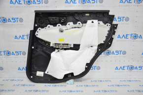 Capacul usii spate stanga Ford Edge 15-18, piele neagra cu insertie bej, plastic alb decolorat, capacul uzat.