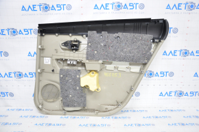 Capacul usii spate stanga Toyota Prius V 12-17, piele bej, cusatura, zgarieturi.