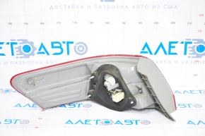 Lampa exterioară aripă dreapta Toyota Camry v40 10-11 hibrid, crăpată, suport rupt.