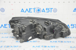 Фара передняя левая VW Passat b7 12-15 USA голая, галоген, песок, под полировку