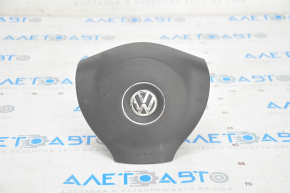 Airbag-ul din volanul șoferului VW Passat b7 12-15 USA negru, conturul AIRBAG este vizibil.