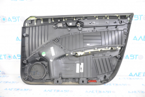 Обшивка двери карточка передняя левая VW Passat b7 12-15 USA черн с черн вставкой пластик, подлокотник кожа, молдинг серый глянец, прижата, трещина в накладке