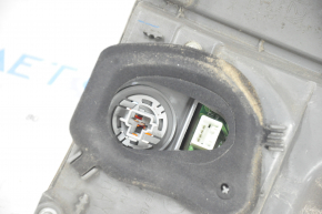 Lampa exterioară aripă stângă Toyota Sienna 11-14, micro-fisuri.