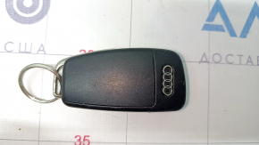 Cheie Audi Q7 4L 10-15 cu 4 butoane, zgârieturi, lipsă un fragment, nu se aruncă