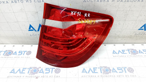 Lampa exterioară aripă dreaptă BMW X3 F25 11-17 este uzată, suporturile sunt rupte.