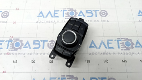 Joystick-ul pentru controlul monitorului de pe BMW X3 F25 11-17 are acoperirea deteriorată.