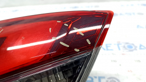 Фонарь внутренний крышка багажника левый Nissan Rogue 17-20 царапины