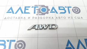 Emblema cu inscripția "AWD" de pe ușa portbagajului Toyota Rav4 19-