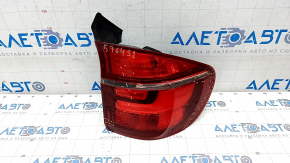 Lampa aripa exterioara dreapta BMW X5 E70 11-13 repaus, fisuri pe sticla, zgarieturi