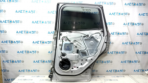 Дверь в сборе задняя правая Ford Escape MK3 13-19 серебро UX, вмятина