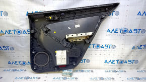 Обшивка двери карточка задняя левая VW Jetta 11-14 USA черн с беж вставкой пластик, подлокотник беж кожа, молдинг серый структура, царапины, потертости
