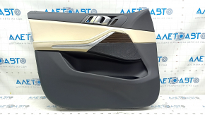 Обшивка двери карточка передняя левая BMW X5 G05 19-23 кожа schwarz/Canberra-Beige, вставка под дерево Fineline Stripe, подлокотник кожа бежевая, с ручкой и накладками, тычки, примятость