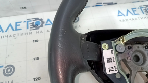 Руль голый Nissan Leaf 13-17 кожа черная с подогревом, царапины, протерт, вмятины