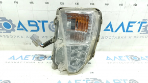 Поворотник левый Toyota Prius 30 13-15 рест, песок, царапины