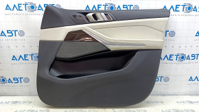 Обшивка двери карточка передняя правая BMW X5 G05 19-23 кожа schwarz/ELFENBEINWEISS, вставка под дерево Fineline Stripe, подлокотник кожа бежевая, с ручкой и накладками, под массаж, примята, тычки