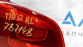 Фонарь внутренний крышка багажника левый VW Tiguan 12-18 рест, мусор под стеклом, треснут отражатель
