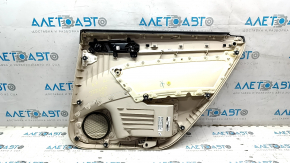 Обшивка двери карточка задняя левая VW Passat b7 12-15 USA беж с беж вставкой кожа, подлокотник беж кожа, молдинг серый глянец, без подсветки, вмятины, царапины, надрыв