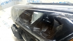 Фара передняя левая в сборе Nissan Leaf 18-24 галоген с креплением песок