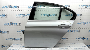 Дверь в сборе задняя левая BMW 3 F30 12-18 серебро A83, вмятина