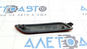 Отражатель заднего бампера левый Toyota Camry v70 18-24