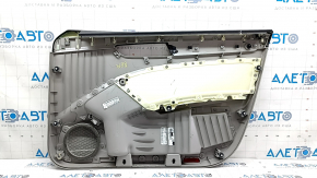Обшивка двери карточка передняя левая VW Passat b8 16-19 USA серая, подлокотник кожа серый, молдинг под темное дерево, под химчистку, трещина в креплении