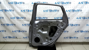 Дверь голая задняя правая VW Jetta 19-26 серебро LB7S, тычка