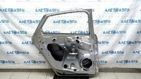 Дверь голая задняя левая Ford Fusion mk5 17-20 серебро UX, вмятина