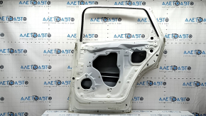 Дверь голая задняя правая Mazda CX-9 16-23 белый 25D, тычки, вмятина