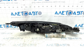 Поворотник ДХО левый Nissan Rogue 21-26 галоген + LED us built, треснуто стекло, песок