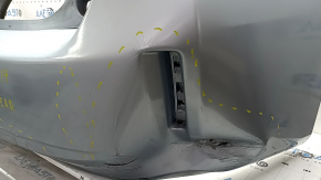 Бампер задний голый Toyota Prius V 12-17 без губы, голубой, примят, надломаны крепления, царапины