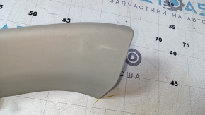 Обшивка двери багажника левая Nissan Leaf 13-17 серая, царапины, побелел пластик