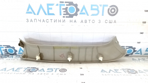 Обшивка двери багажника правая Toyota Sienna 11-20 бежевая