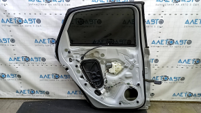 Дверь в сборе задняя левая VW Jetta 19-26 серебро LB9Z, тычка