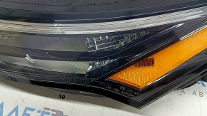 Поворотник ДХО левый Nissan Rogue 21-26 галоген + LED us built, царапины