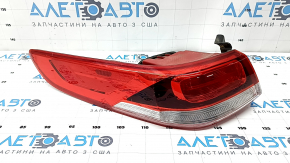 Zgârieturi la lumina de pe aripa exterioară stângă a Kia Optima 16-20